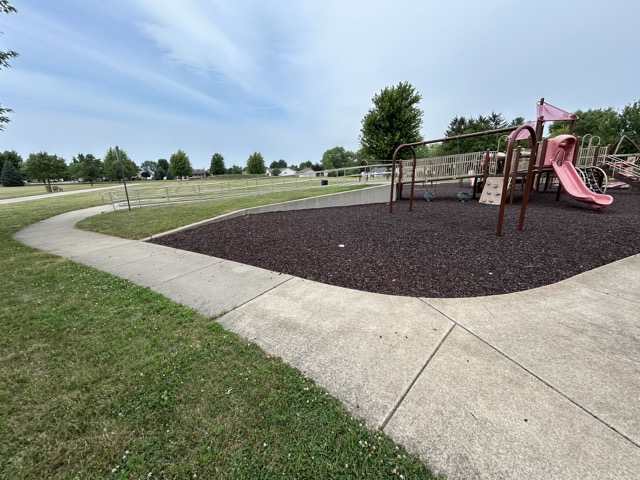 A playground with an accessible ramp is present at Lil's park in Bradley, IL.
