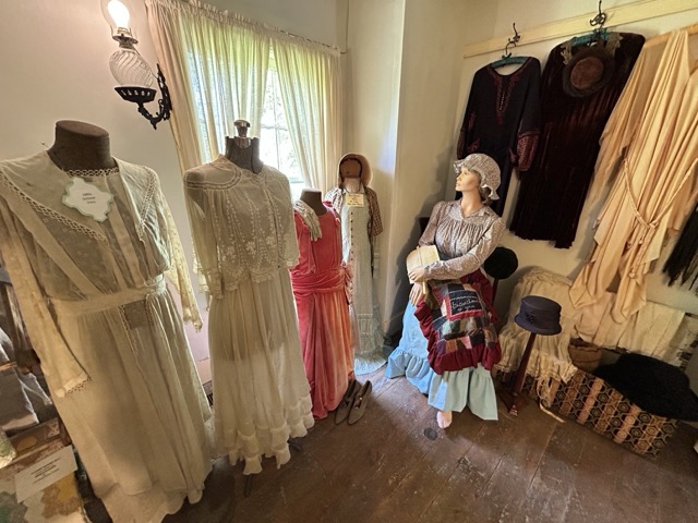 Historic mannequin with 19th-century dress at Letourneau Museum in Bourbonnais