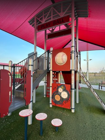 Baseball-themed shaded playground at large sports complex in Bradley, Illinois.