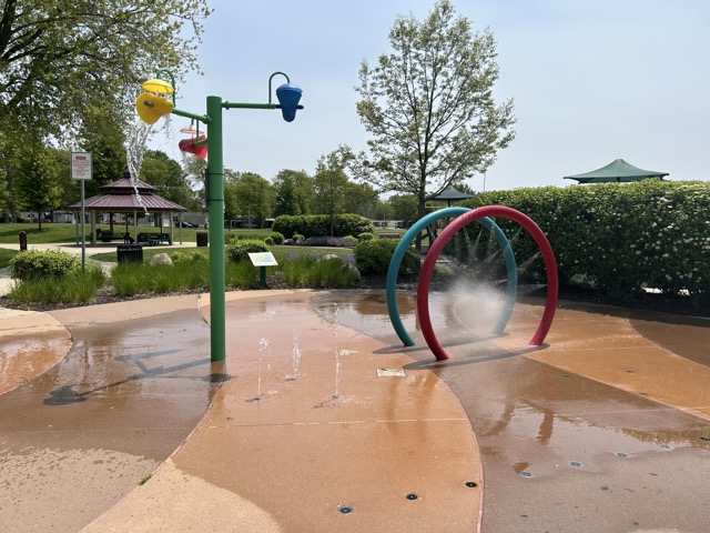 Different angles of the splash pad at Legacy Park.
